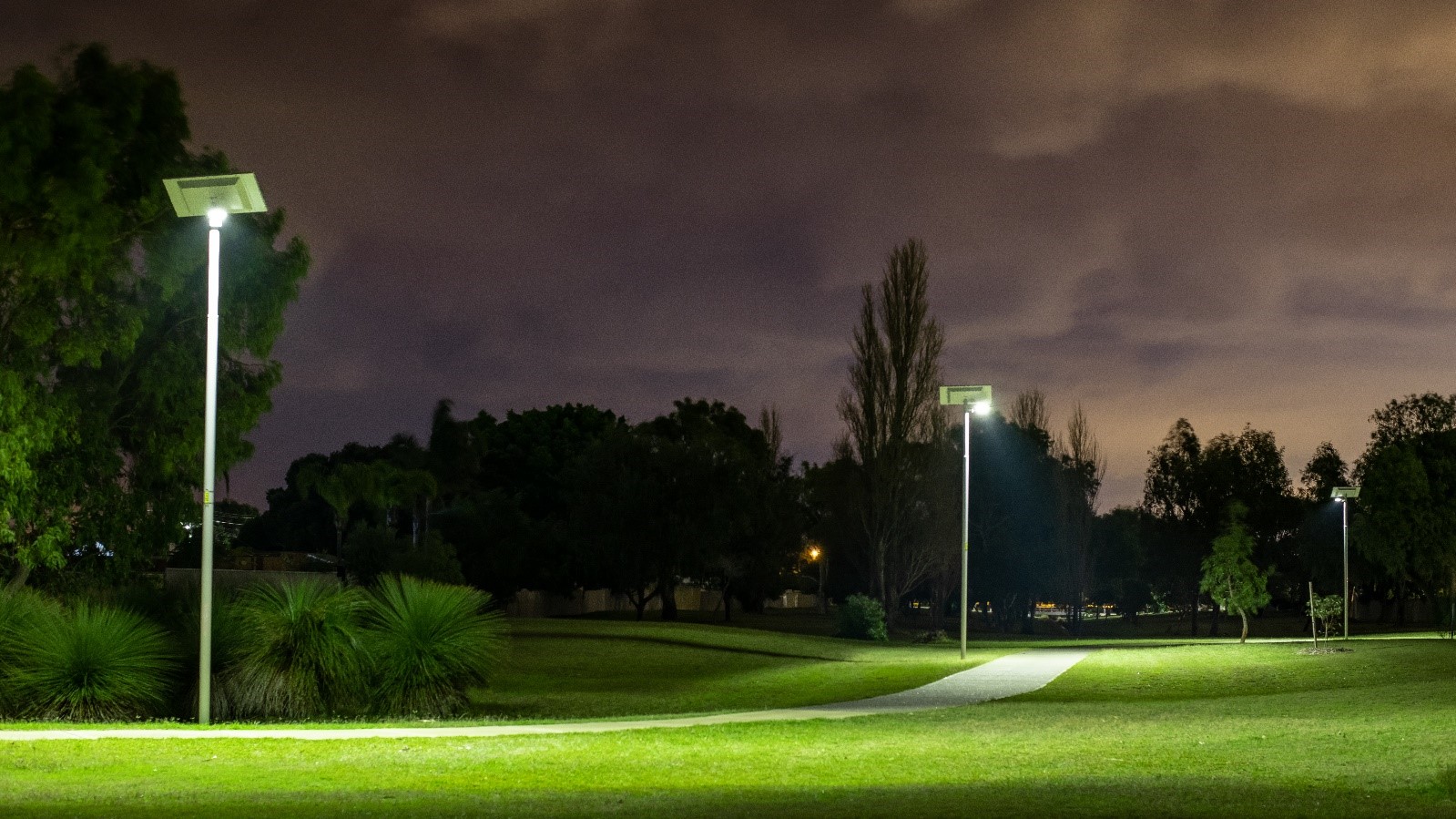 SOLANOVA overhead Solar Street Lights in a park.